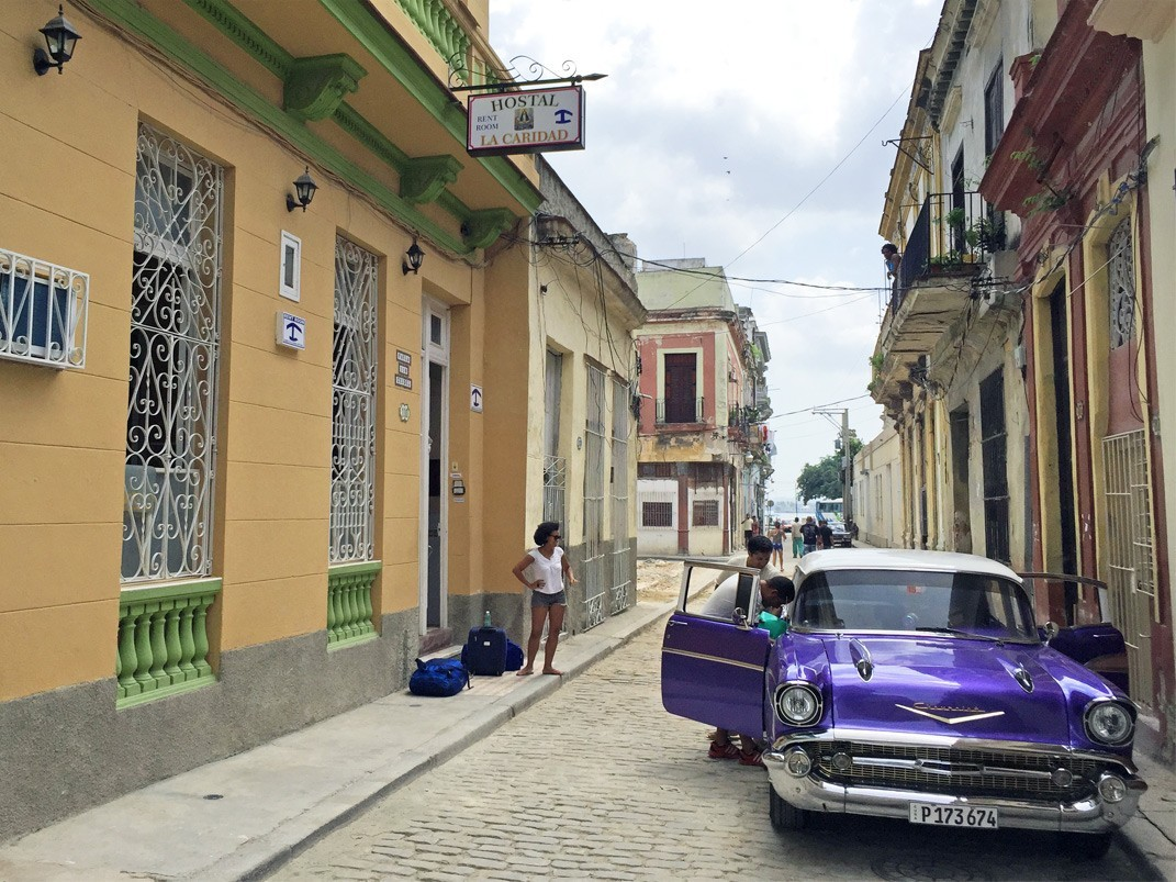 A guest arriving to Hostal La Caridad in Old Havana