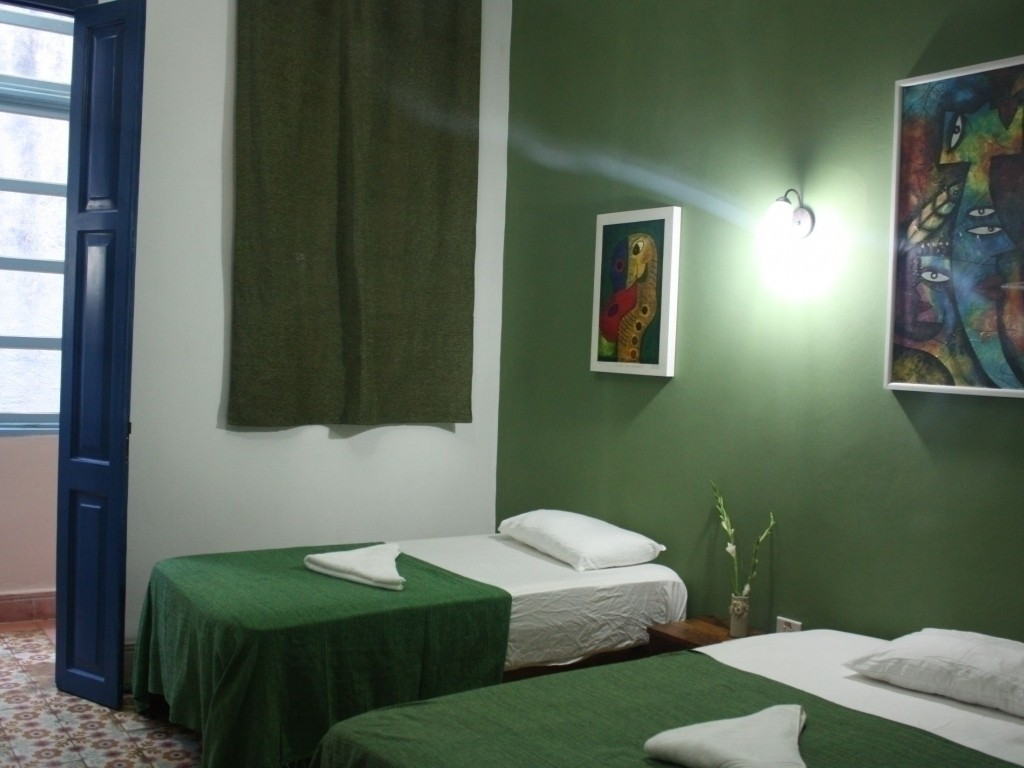 The Green Room of La Gargola Hostal in Old Havana, Cuba